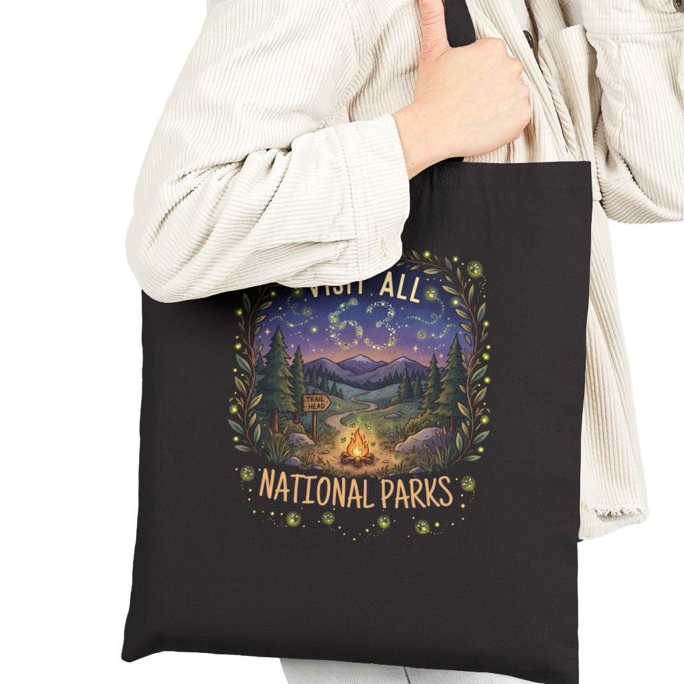 Woman holding a black tote bag